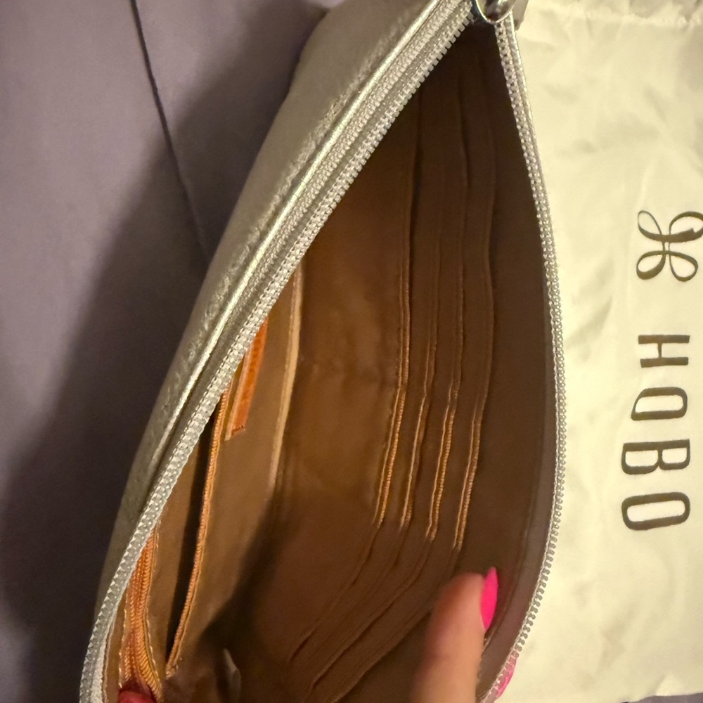 HOBO Vida Metallic Silver Wristlet with silver hardware. - Picture 3 of 3